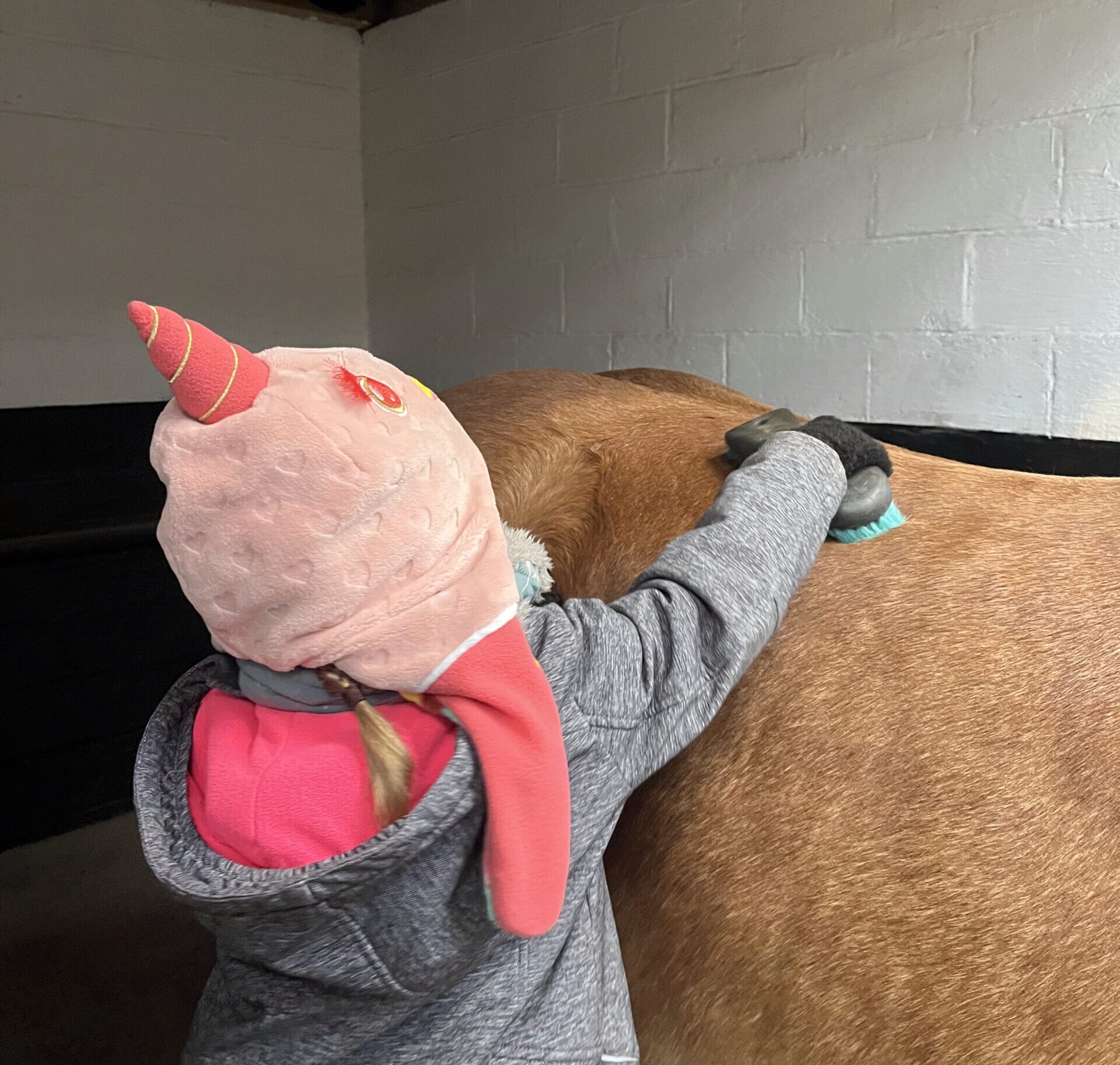 three horses on green ground
